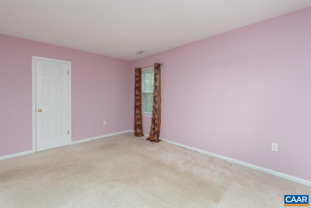 706 Zion Road Zion Crossroads, VA 22942 - Photo 29 of 38 an empty room with an entryway