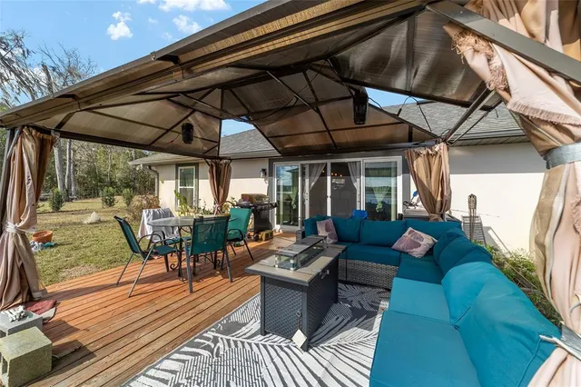 a view of an outdoor sitting area with couch