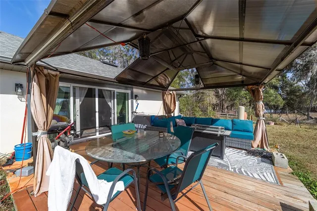 a view of a yard with swimming pool