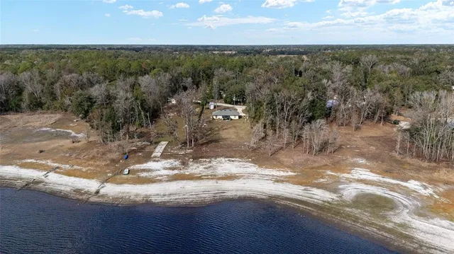 a view of a lake from a yard