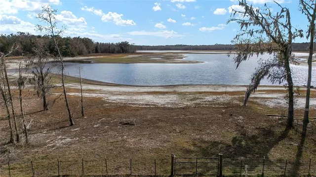 a view of a swimming pool and an outdoor space