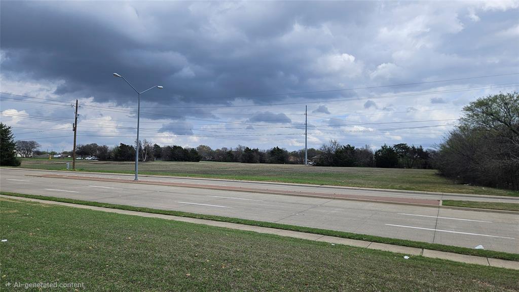 1668 South Clark Road Duncanville, TX 75137 - Photo 2 of 5 a view of a green field