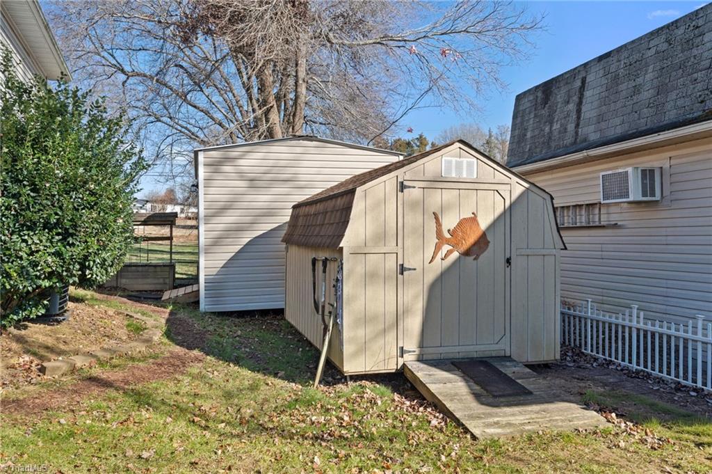 1586 Riverview Rd Extension Lexington, NC 27292 - Photo 32 of 49 Storage Building in Backyard
