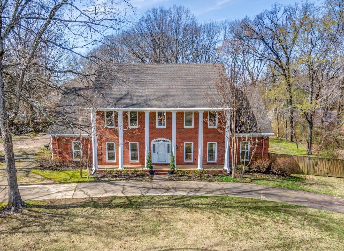 601 North Walnut Bend Road Memphis, TN 38018 - Photo 1 of 25 front view of a house with a swimming pool