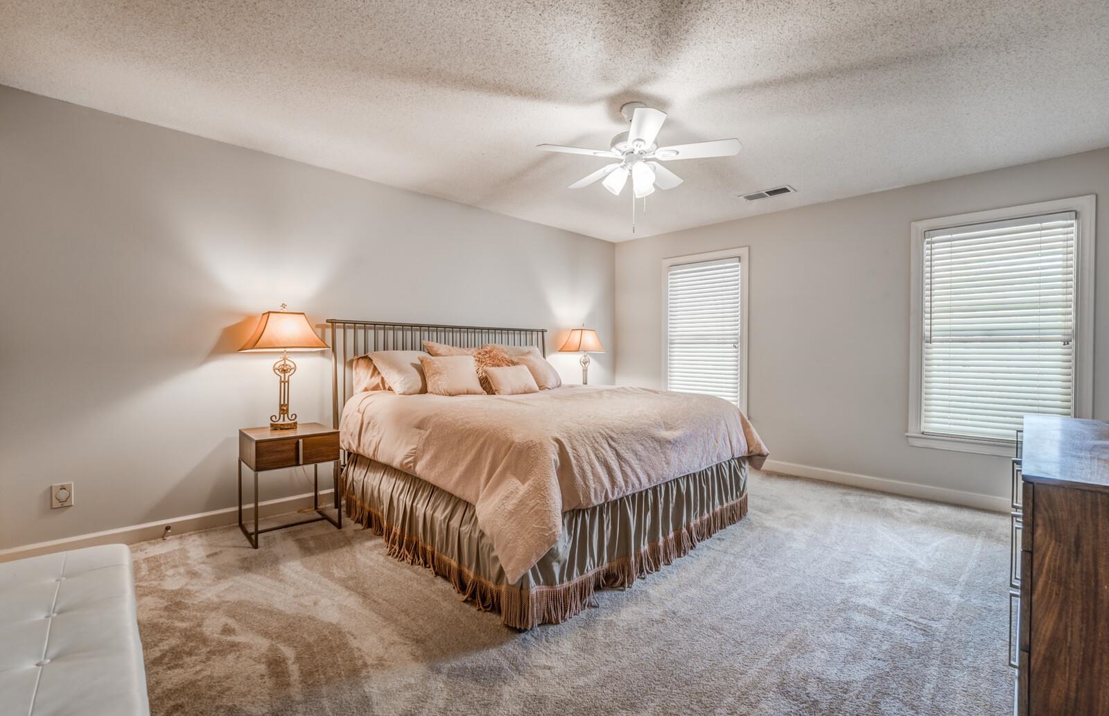 601 North Walnut Bend Road Memphis, TN 38018 - Photo 16 of 25 a bedroom with a bed and a chandelier