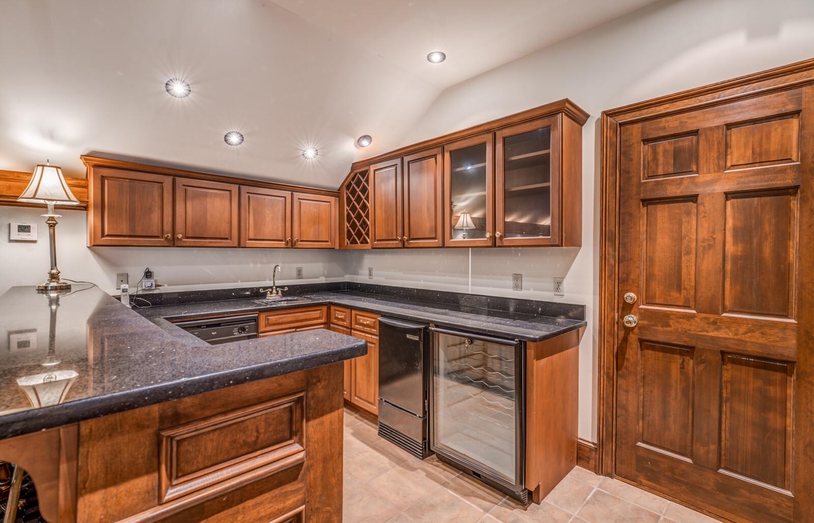 601 North Walnut Bend Road Memphis, TN 38018 - Photo 20 of 25 a kitchen with stainless steel appliances granite countertop a stove sink and cabinets