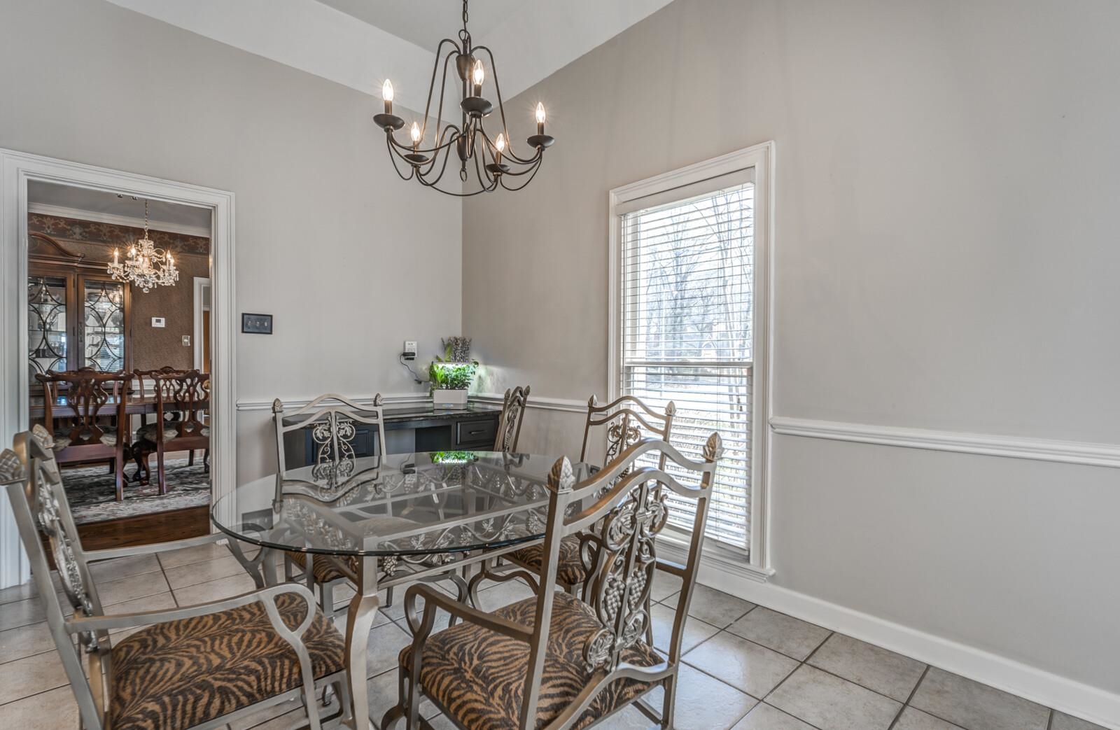601 North Walnut Bend Road Memphis, TN 38018 - Photo 6 of 25 a view of a dining room with furniture and chandelier