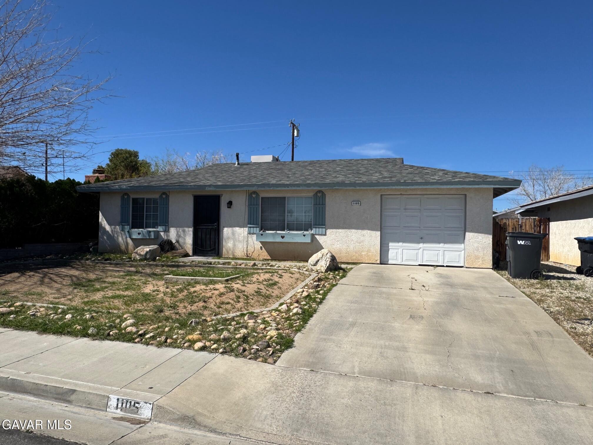 1105 South McCall Street Ridgecrest, CA 93555 - Photo 1 of 12 a front view of a house with entertaining space
