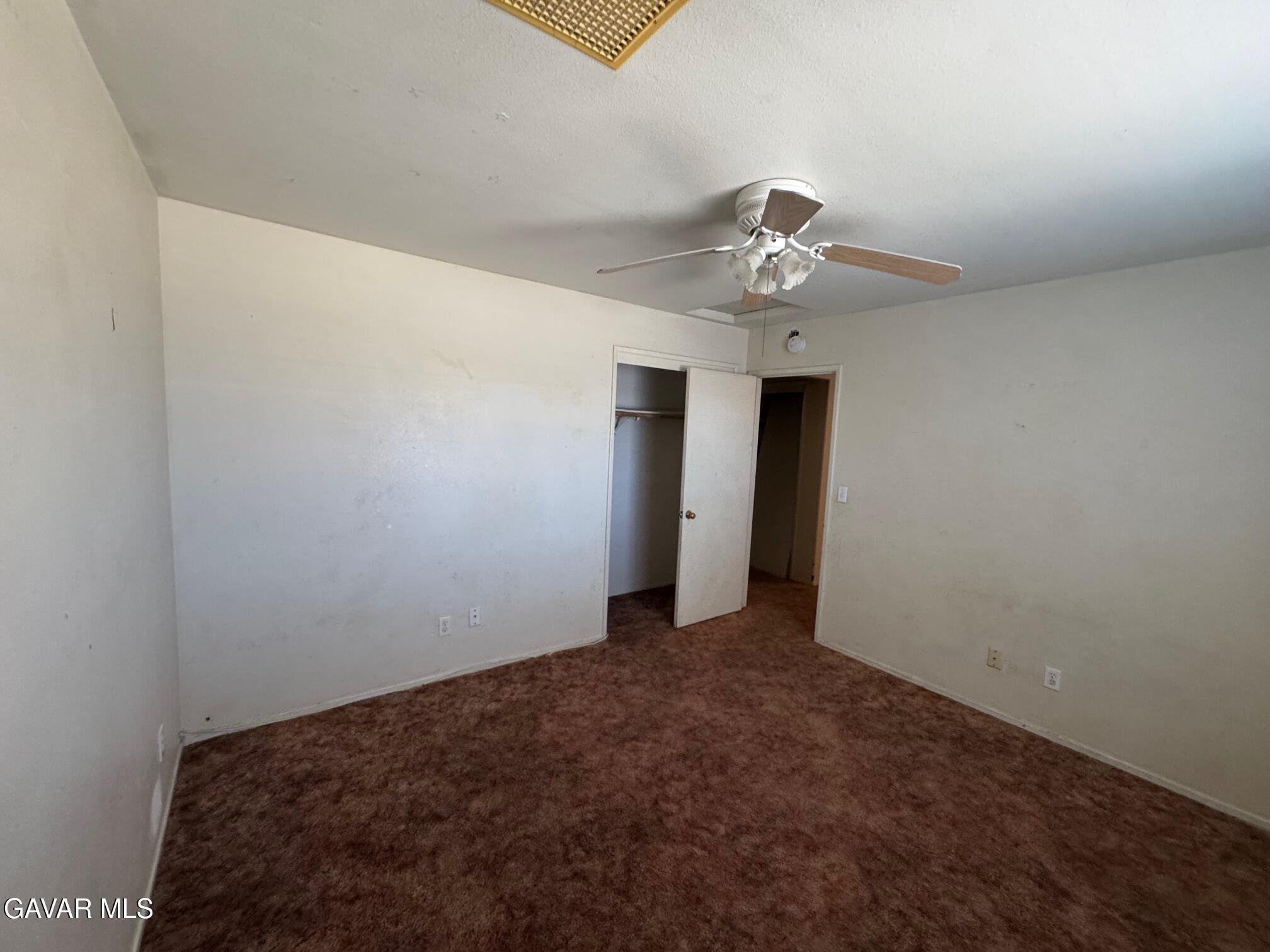 1105 South McCall Street Ridgecrest, CA 93555 - Photo 10 of 12 a view of a big room with carpet