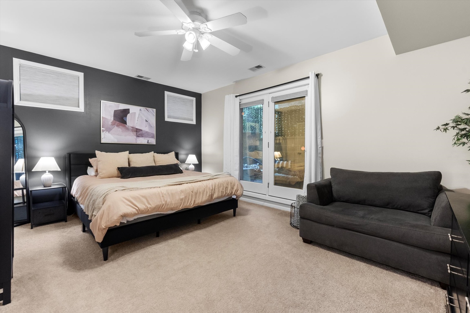 3531 North Reta Avenue, Unit 1 Chicago, IL 60657 - Photo 23 of 63 a bedroom with a bed couch and window