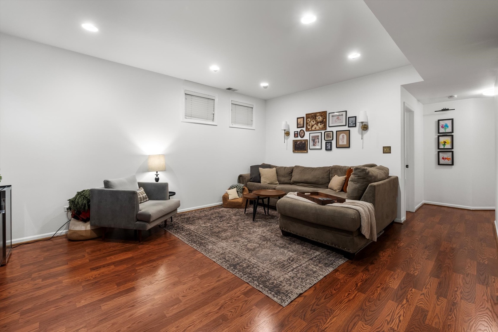 3531 North Reta Avenue, Unit 1 Chicago, IL 60657 - Photo 27 of 63 a living room with furniture and wooden floor