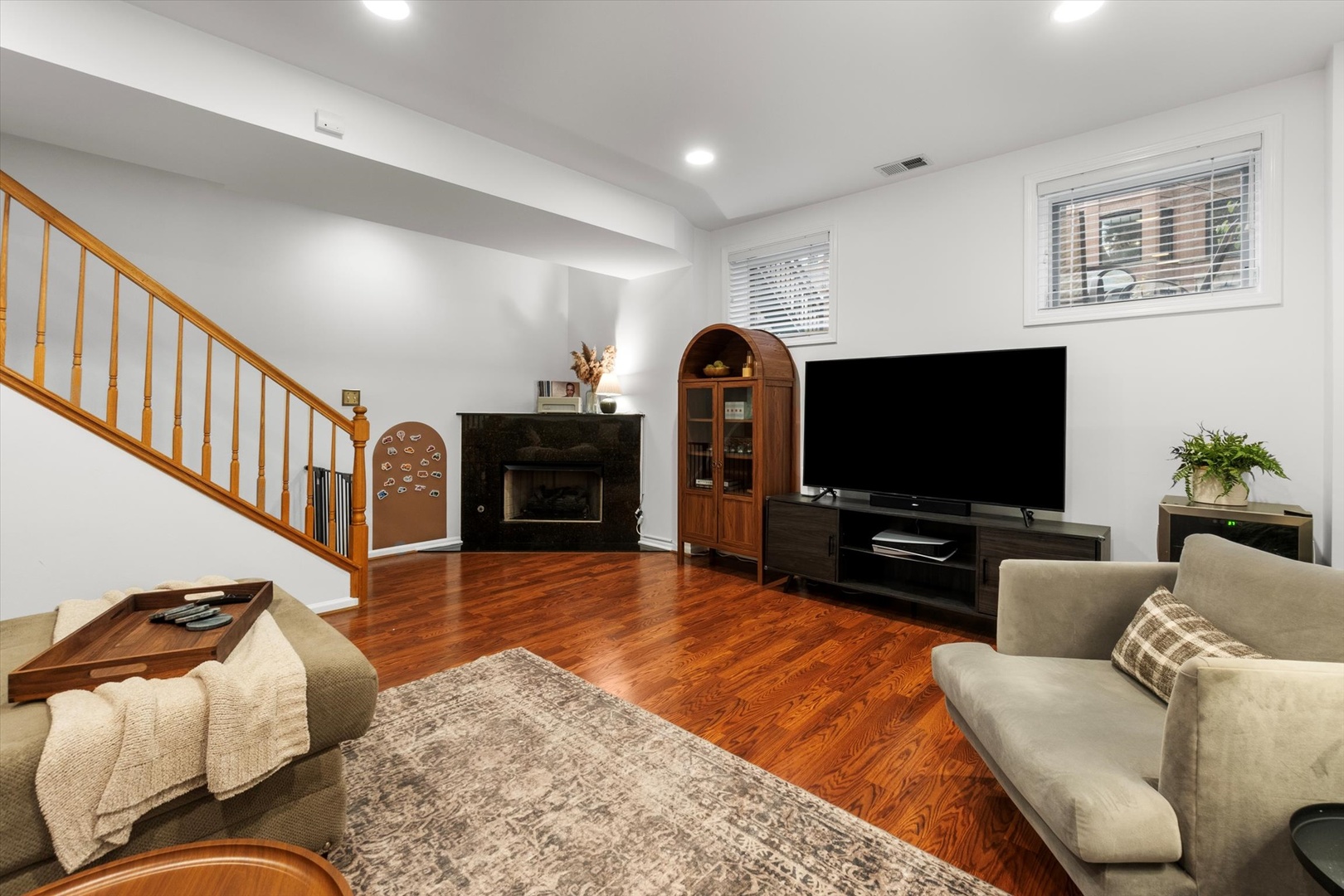 3531 North Reta Avenue, Unit 1 Chicago, IL 60657 - Photo 29 of 63 a living room with furniture and a flat screen tv