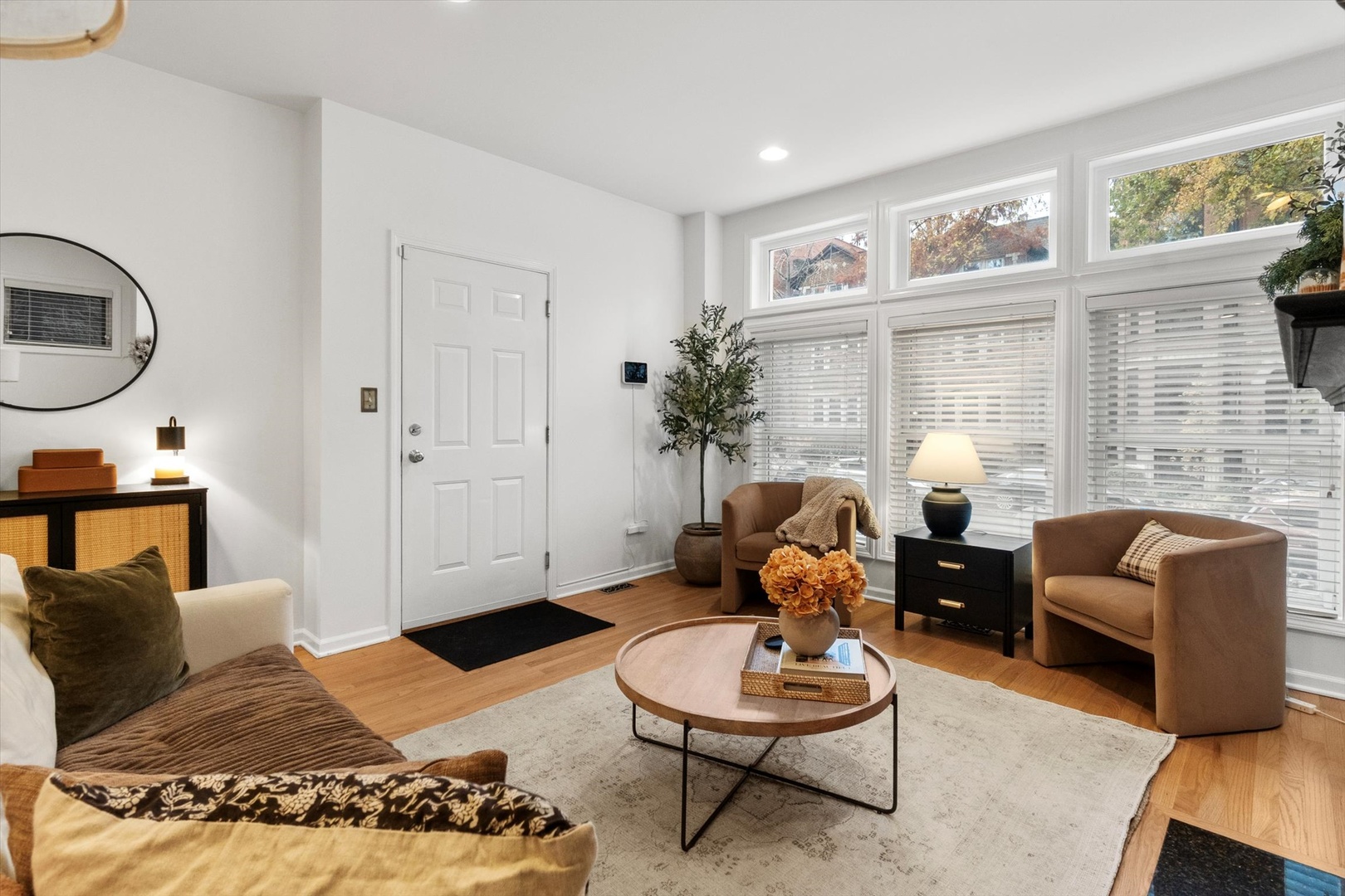 3531 North Reta Avenue, Unit 1 Chicago, IL 60657 - Photo 4 of 63 a living room with furniture and a painting on the wall
