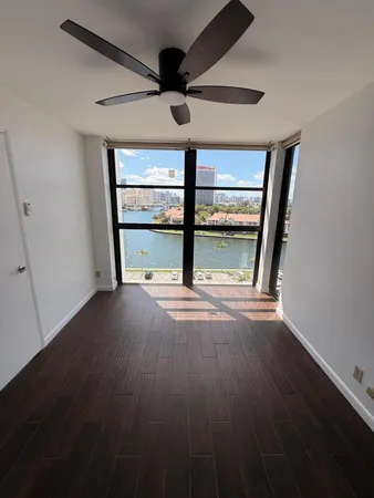 a bathroom with a toilet a sink and a shower