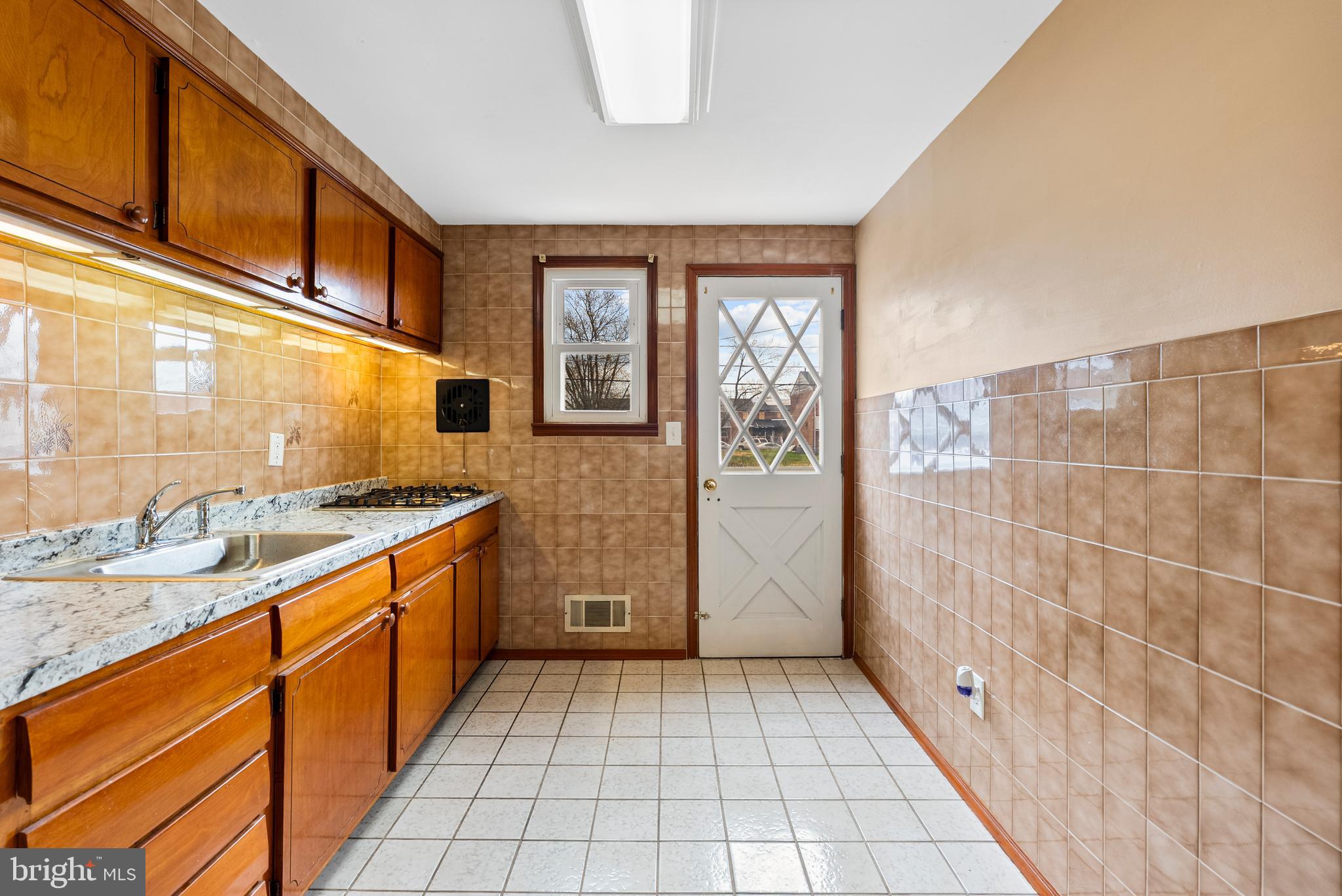 1041 Foxwood Lane Baltimore, MD 21221 - Photo 15 of 45 a bathroom with a sink a toilet and shower