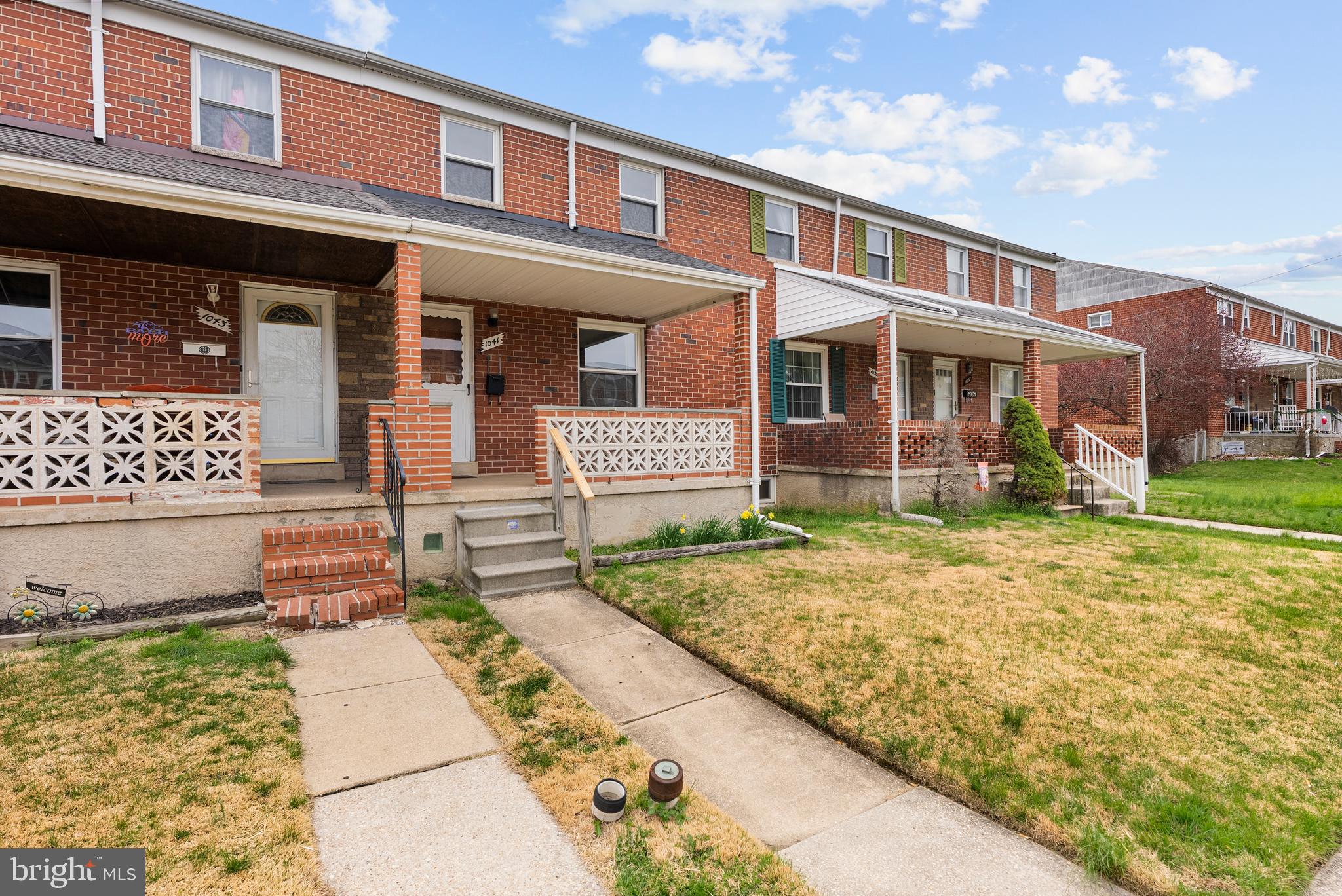 1041 Foxwood Lane Baltimore, MD 21221 - Photo 2 of 45 a front view of a house with garden