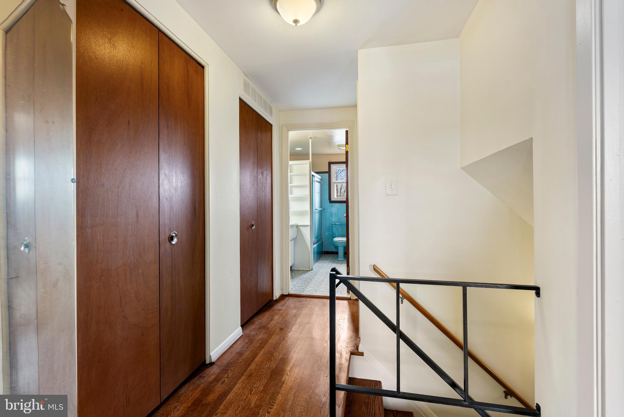 1041 Foxwood Lane Baltimore, MD 21221 - Photo 21 of 45 a view of a hallway with wooden floor and staircase