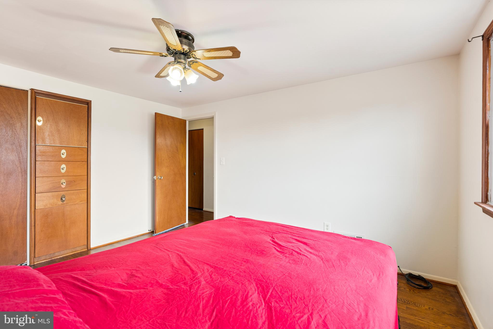 1041 Foxwood Lane Baltimore, MD 21221 - Photo 25 of 45 a bedroom with a bed and a ceiling fan