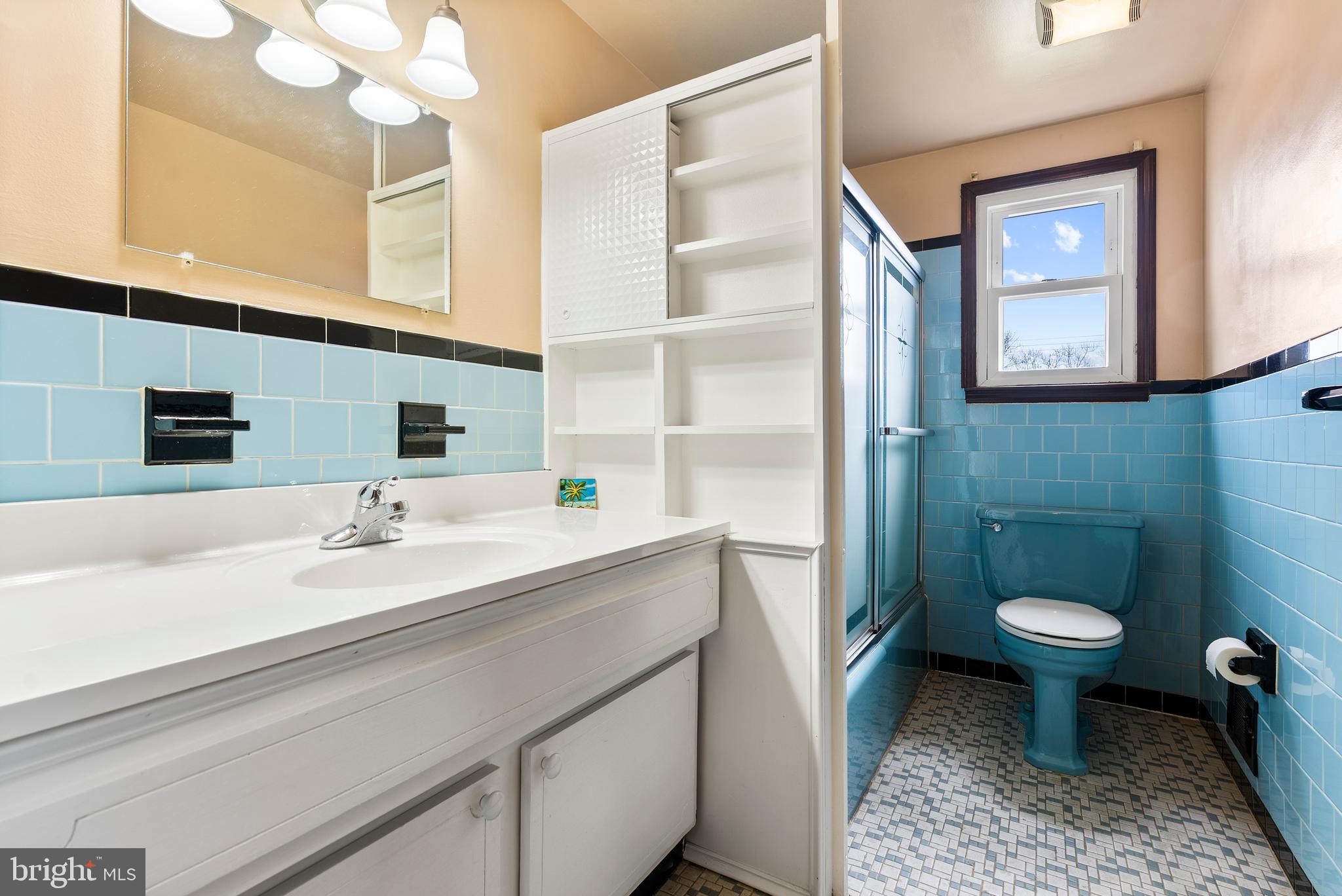 1041 Foxwood Lane Baltimore, MD 21221 - Photo 27 of 45 a bathroom with a sink and a mirror