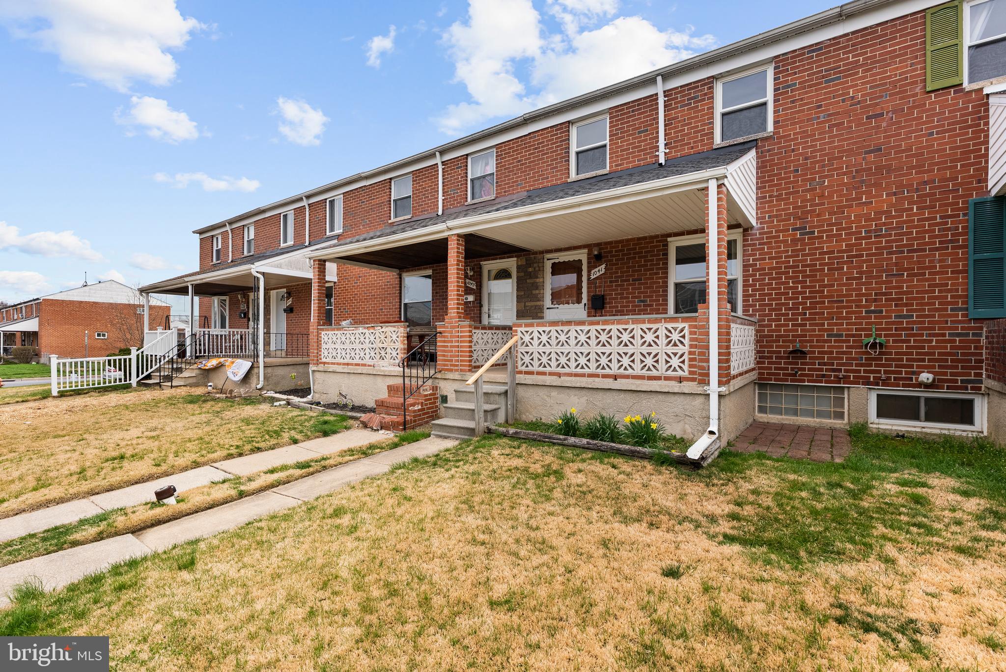 1041 Foxwood Lane Baltimore, MD 21221 - Photo 3 of 45 a front view of a house with a yard outdoor seating and barbeque oven