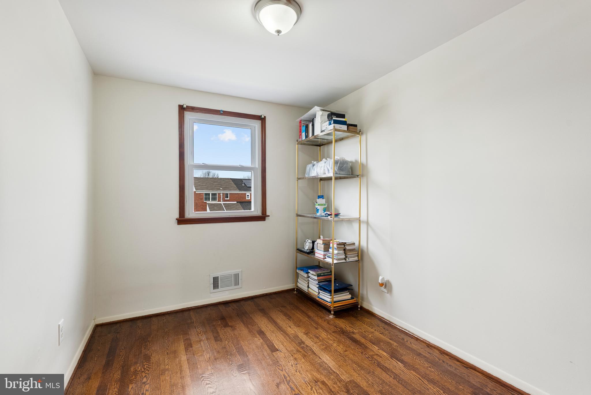 1041 Foxwood Lane Baltimore, MD 21221 - Photo 31 of 45 a view of an empty room and wooden floor