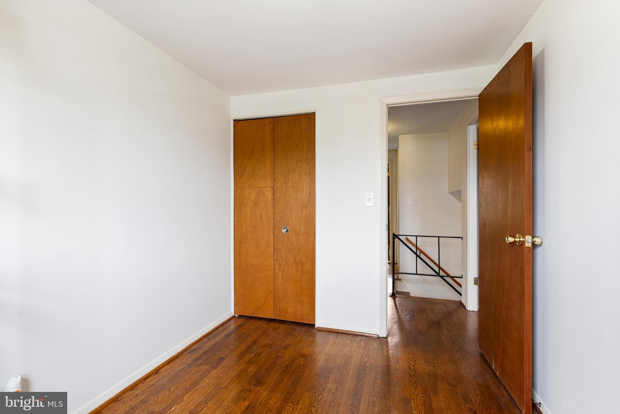 1041 Foxwood Lane Baltimore, MD 21221 - Photo 32 of 45 a view of hallway with wooden floor