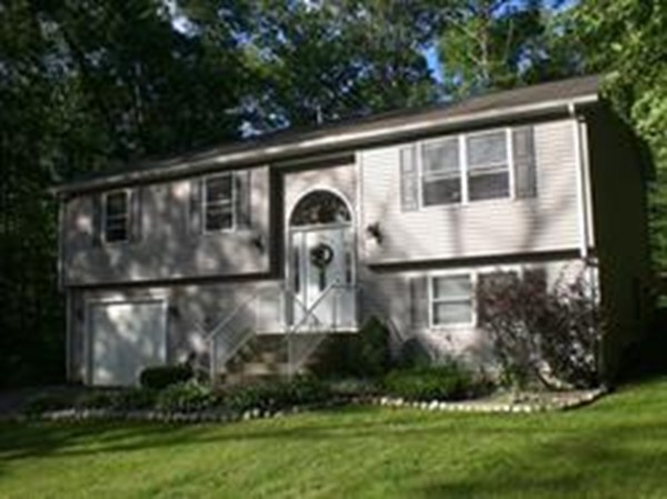 100 Crestwood Road Brimfield, MA 01010 - Photo 2 of 28 a front view of a house with garden