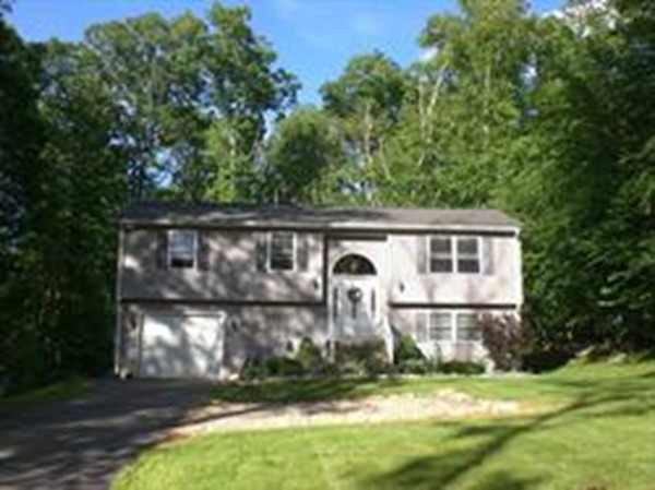 100 Crestwood Road Brimfield, MA 01010 - Photo 3 of 28 front view of a house with a yard
