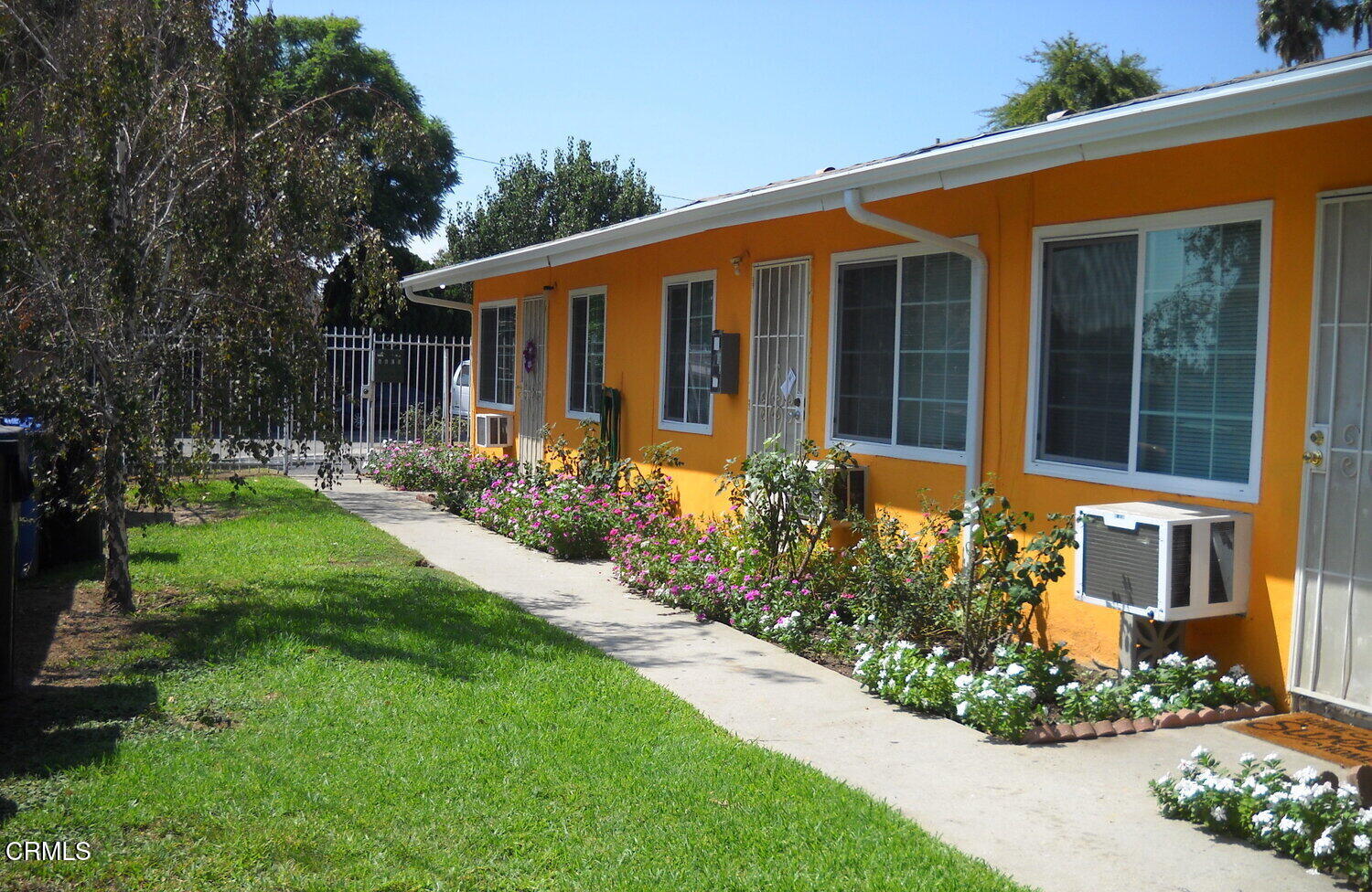9501 Steele Street, Unit D Rosemead, CA 91770 - Photo 1 of 20 front view of a house with a yard