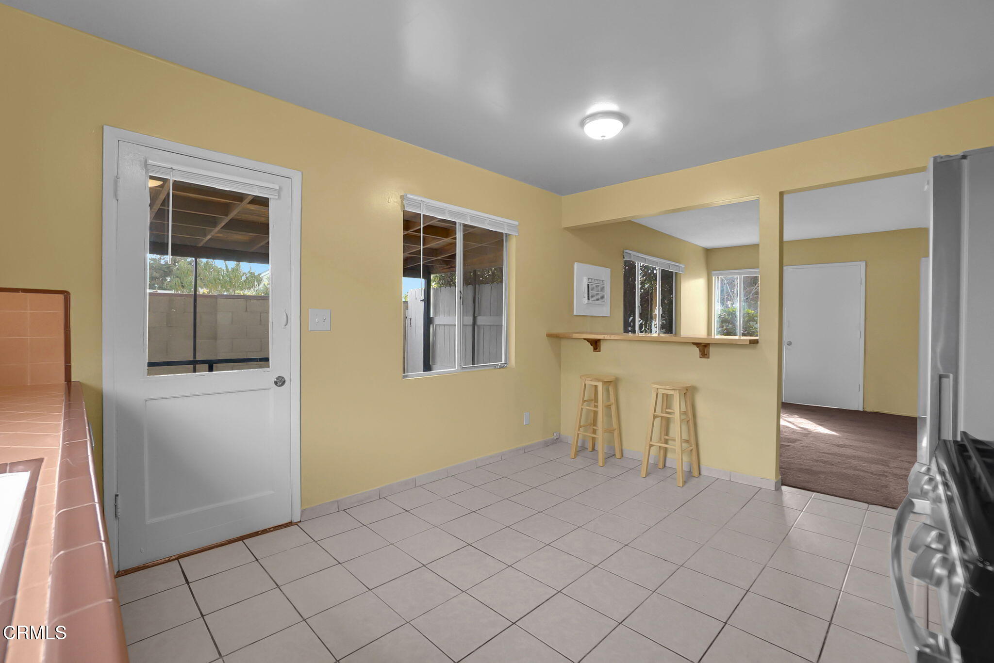 9501 Steele Street, Unit D Rosemead, CA 91770 - Photo 12 of 20 a view of a livingroom with furniture and front door