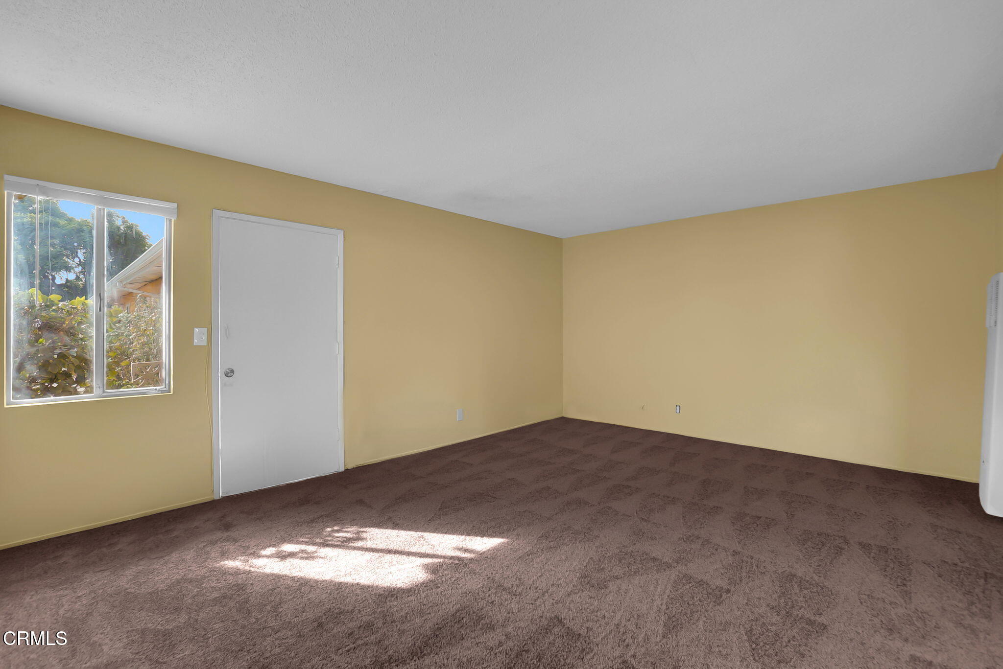 9501 Steele Street, Unit D Rosemead, CA 91770 - Photo 2 of 20 an empty room with windows