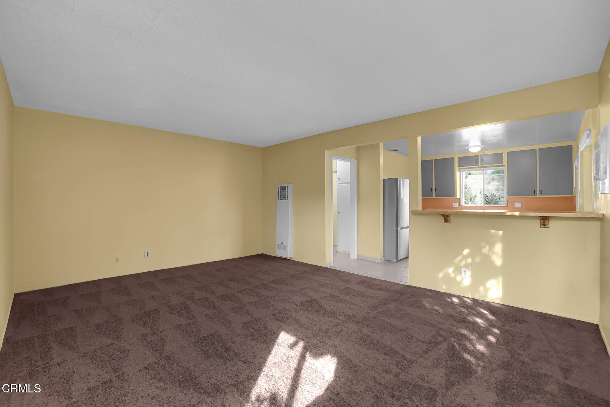 9501 Steele Street, Unit D Rosemead, CA 91770 - Photo 3 of 20 a view of a big room with windows and a kitchen