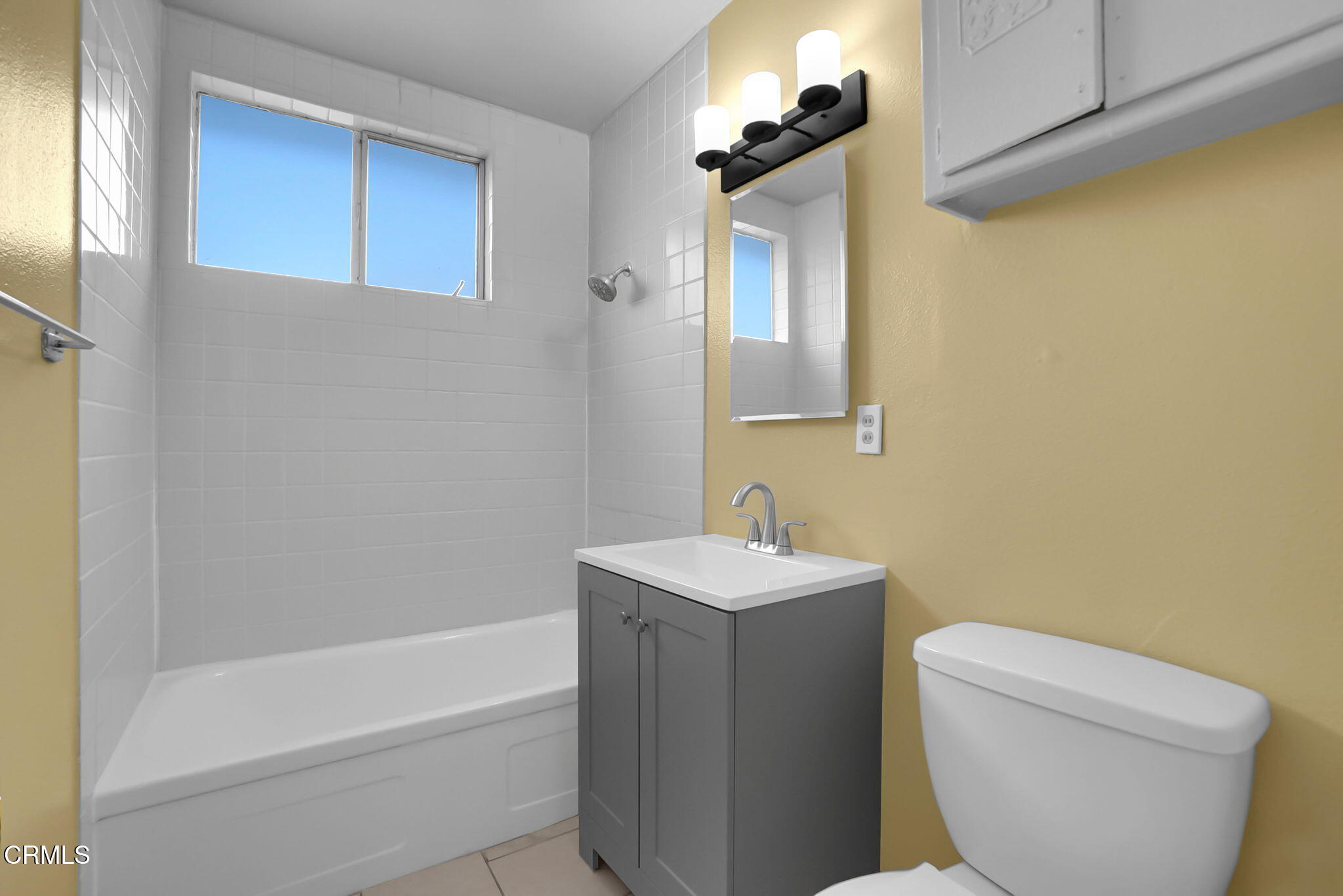 9501 Steele Street, Unit D Rosemead, CA 91770 - Photo 8 of 20 a bathroom with a toilet a sink and bathtub