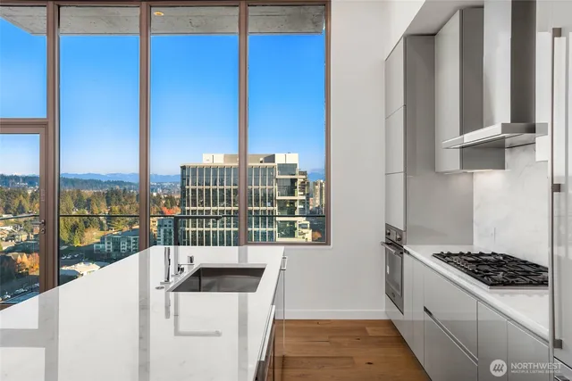a kitchen view with a stove and a kitchen island