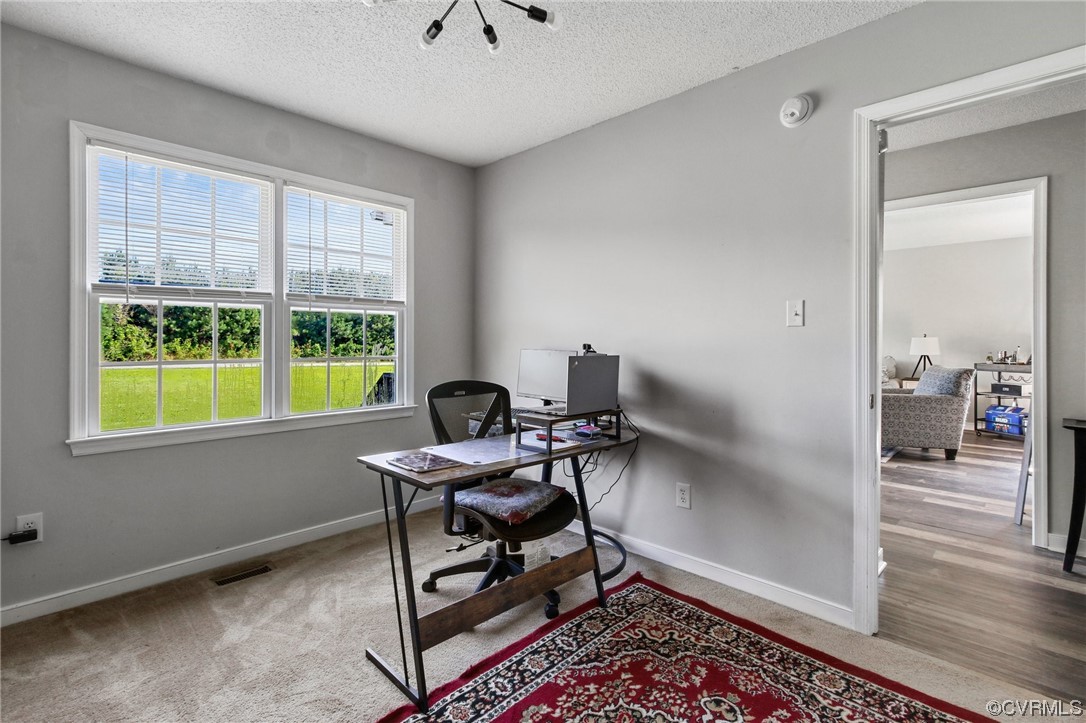 8376 Pine Acres Lane Carson, VA 23830 - Photo 12 of 21 a workspace with furniture and a window