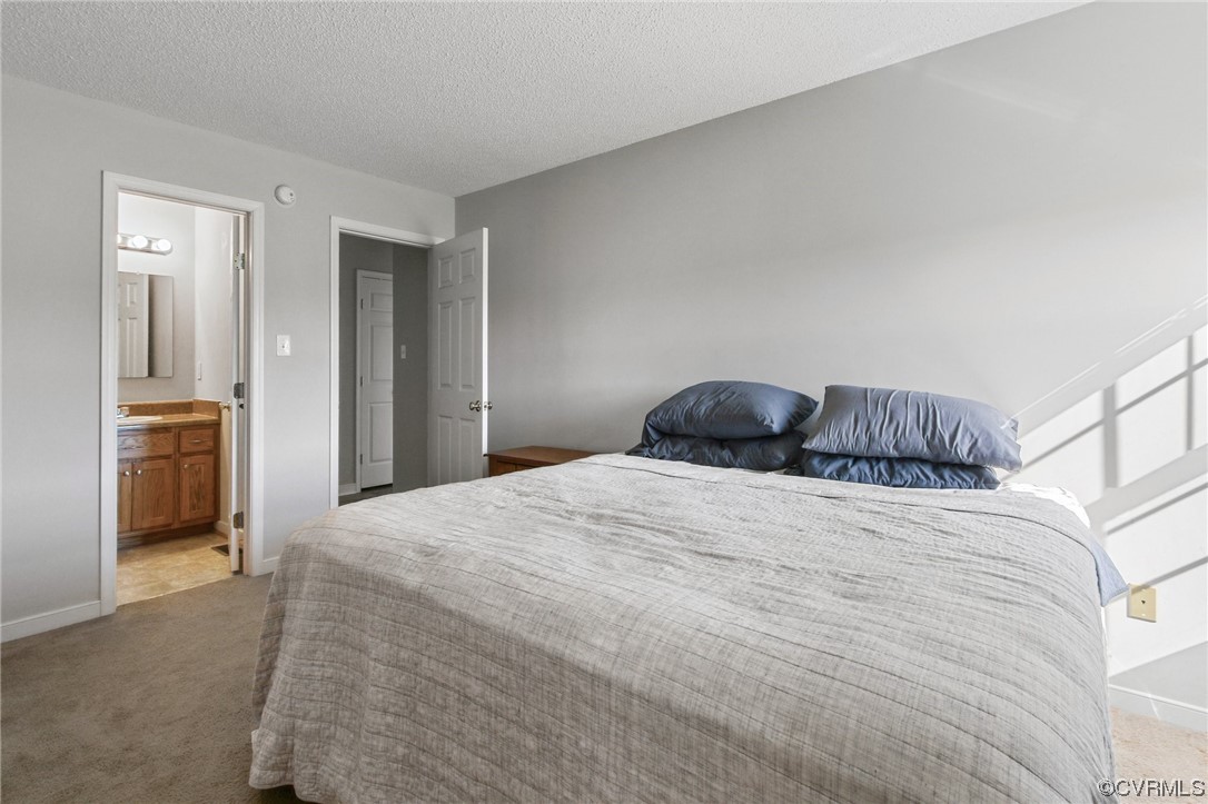 8376 Pine Acres Lane Carson, VA 23830 - Photo 14 of 21 a bedroom with a bed and wooden floor
