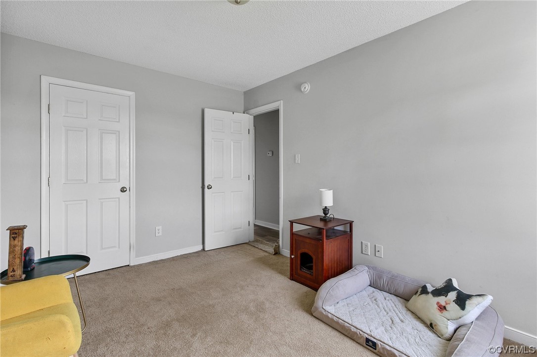 8376 Pine Acres Lane Carson, VA 23830 - Photo 17 of 21 a view of room with workspace and a couch
