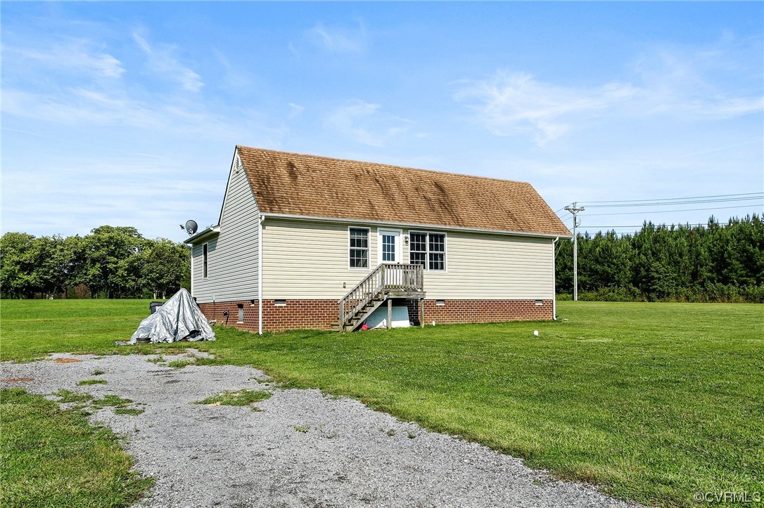 8376 Pine Acres Lane Carson, VA 23830 - Photo 18 of 21 a view of a house with a yard and pathway