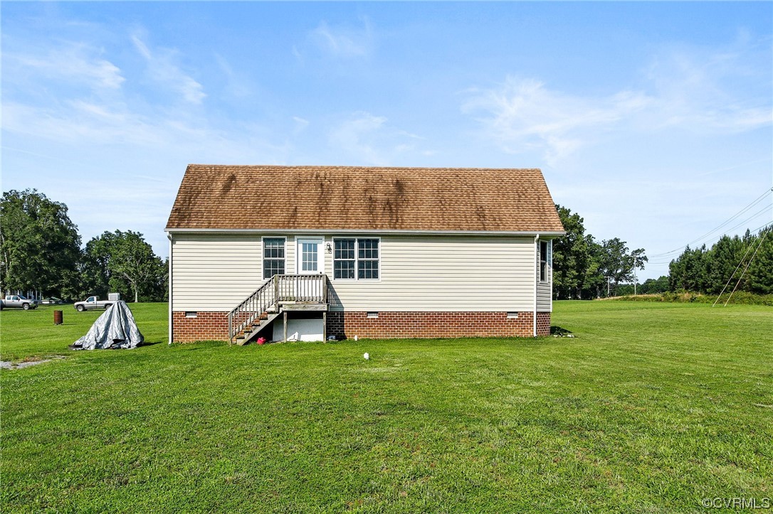 8376 Pine Acres Lane Carson, VA 23830 - Photo 19 of 21 a view of a house with a yard and sitting area