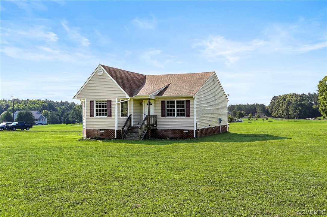 8376 Pine Acres Lane Carson, VA 23830 - Photo 3 of 21 a view of a house with a yard