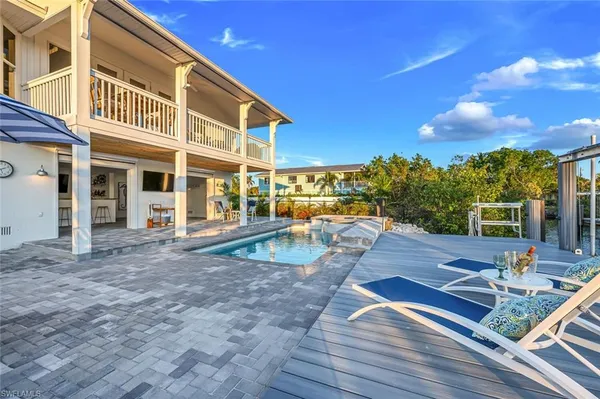 a view of a house with entertaining space