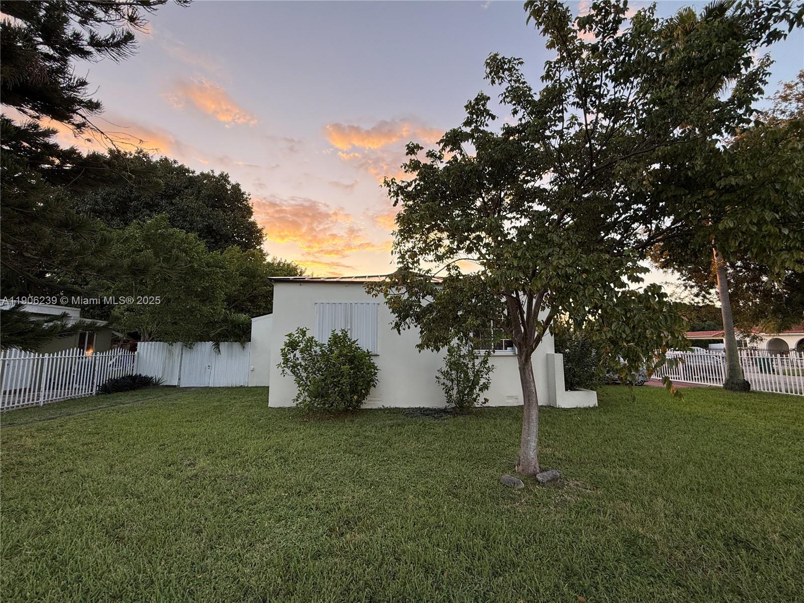 6300 Northwest 2nd Street Miami, FL 33126 - Photo 16 of 26 a view of a backyard with large trees