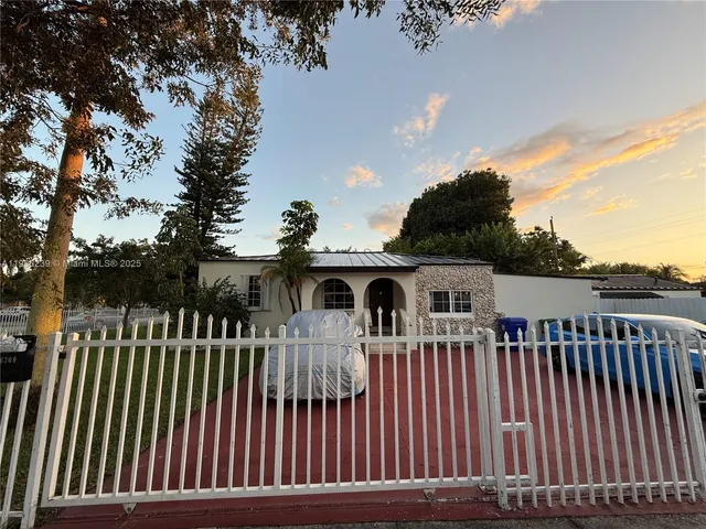 a front view of a house with a deck