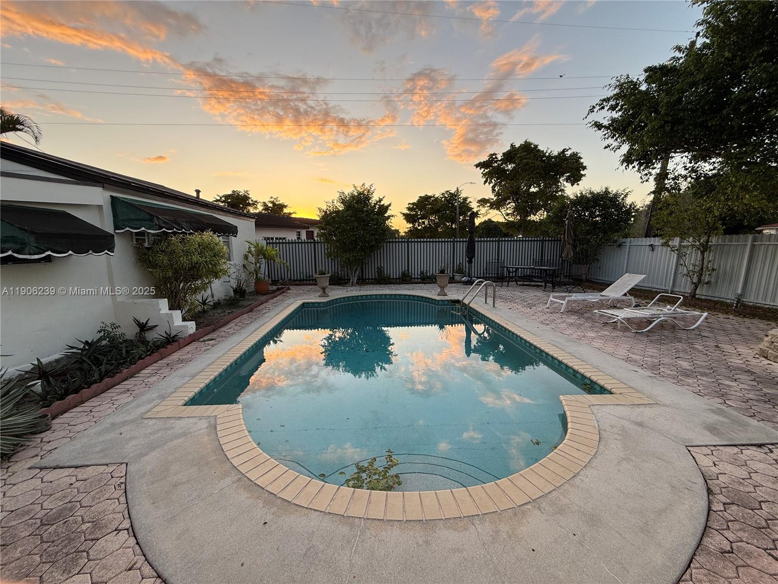 6300 Northwest 2nd Street Miami, FL 33126 - Photo 24 of 26 a view of swimming pool with seating area