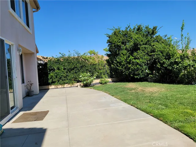 a view of an outdoor space and tennis court