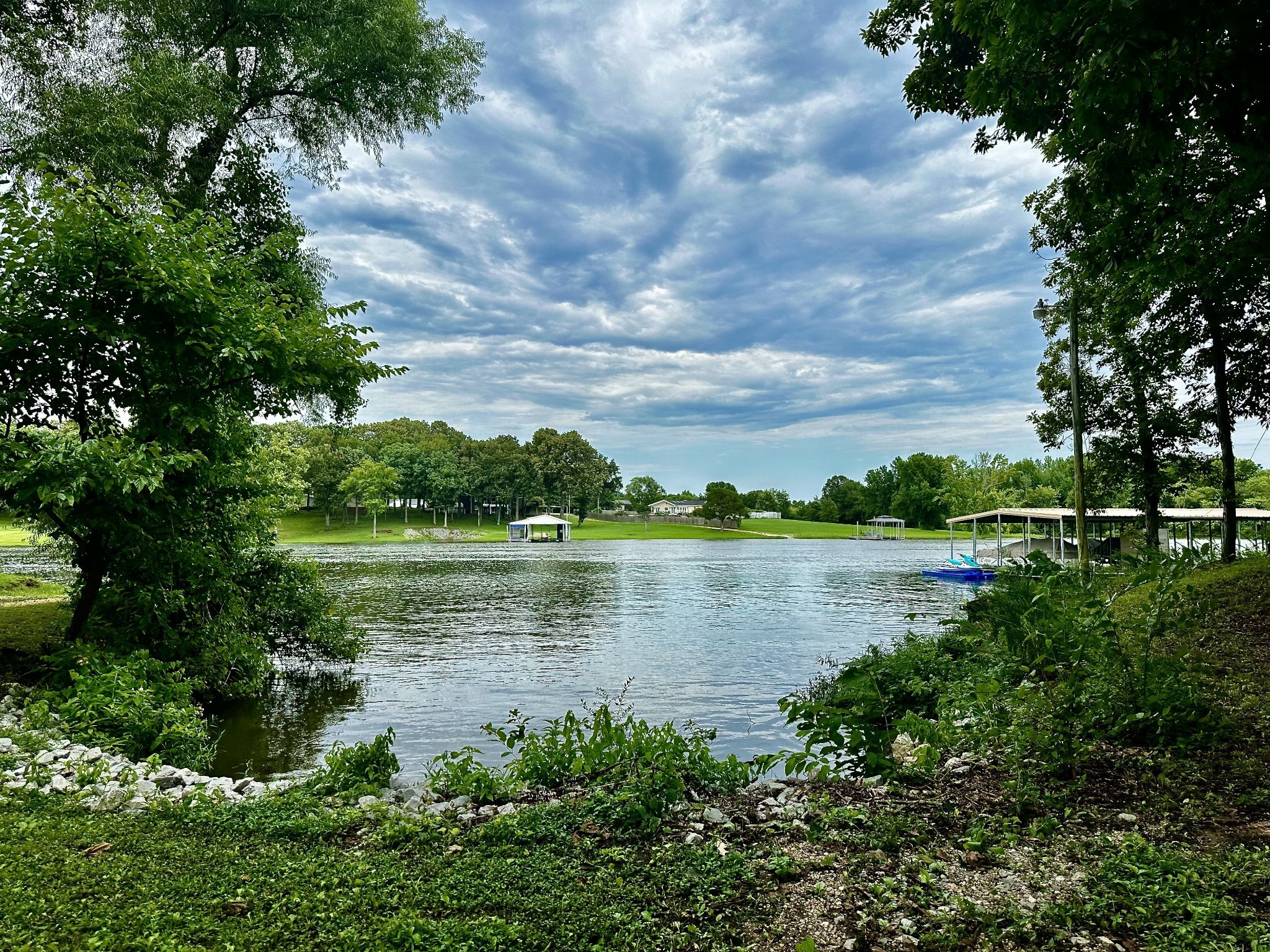 0 Eva Harbor Road Eva, TN 38333 - Photo 1 of 7 a view of a lake with houses in the back