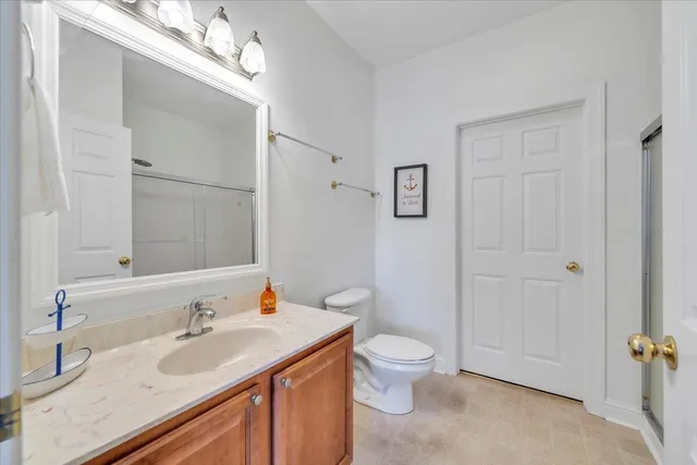 a view of a wooden house with a yard