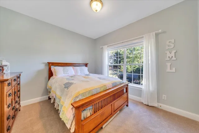 a front view of a house with a garage