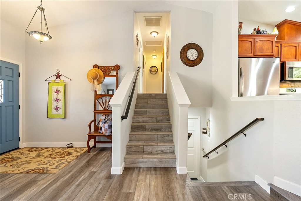 11625 Cenegal Road Atascadero, CA 93422 - Photo 22 of 65 Let's see the bedrooms and main bathroom. The stairs on the right take you to the attached 2-car garage.