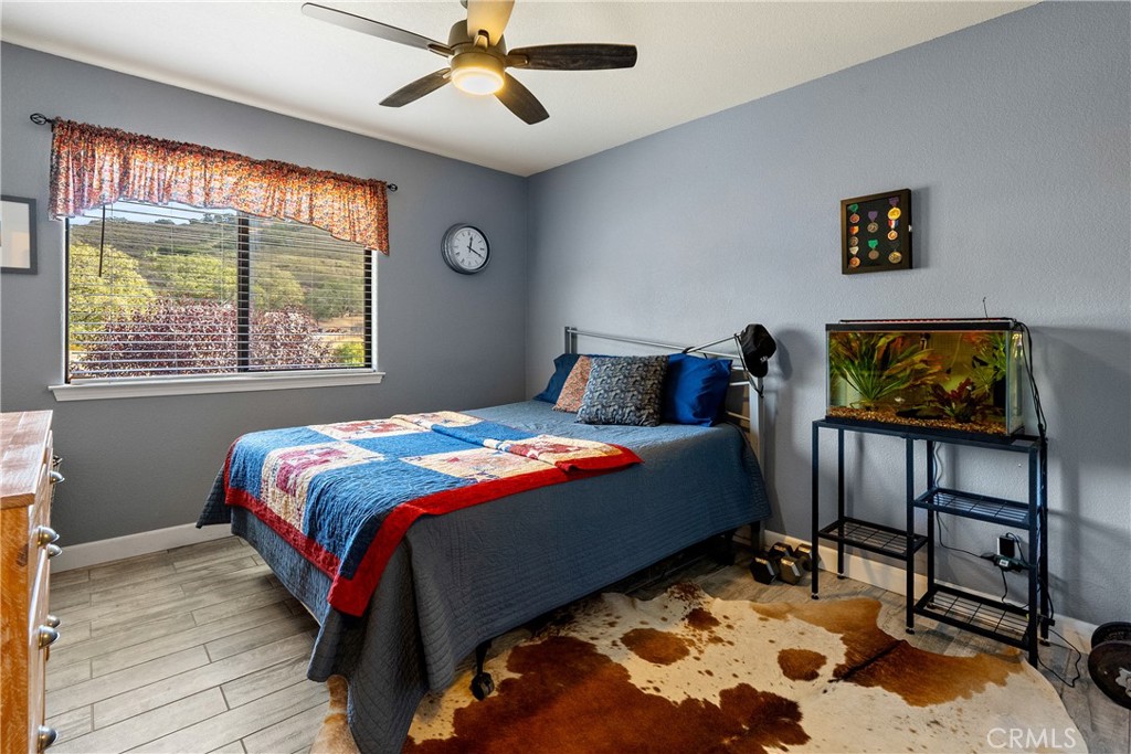 11625 Cenegal Road Atascadero, CA 93422 - Photo 25 of 65 Bedroom 3 also has tile floors and a superb view out the front of the home.